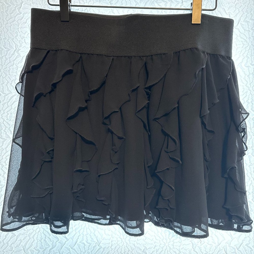 Black ruffle mini skirt